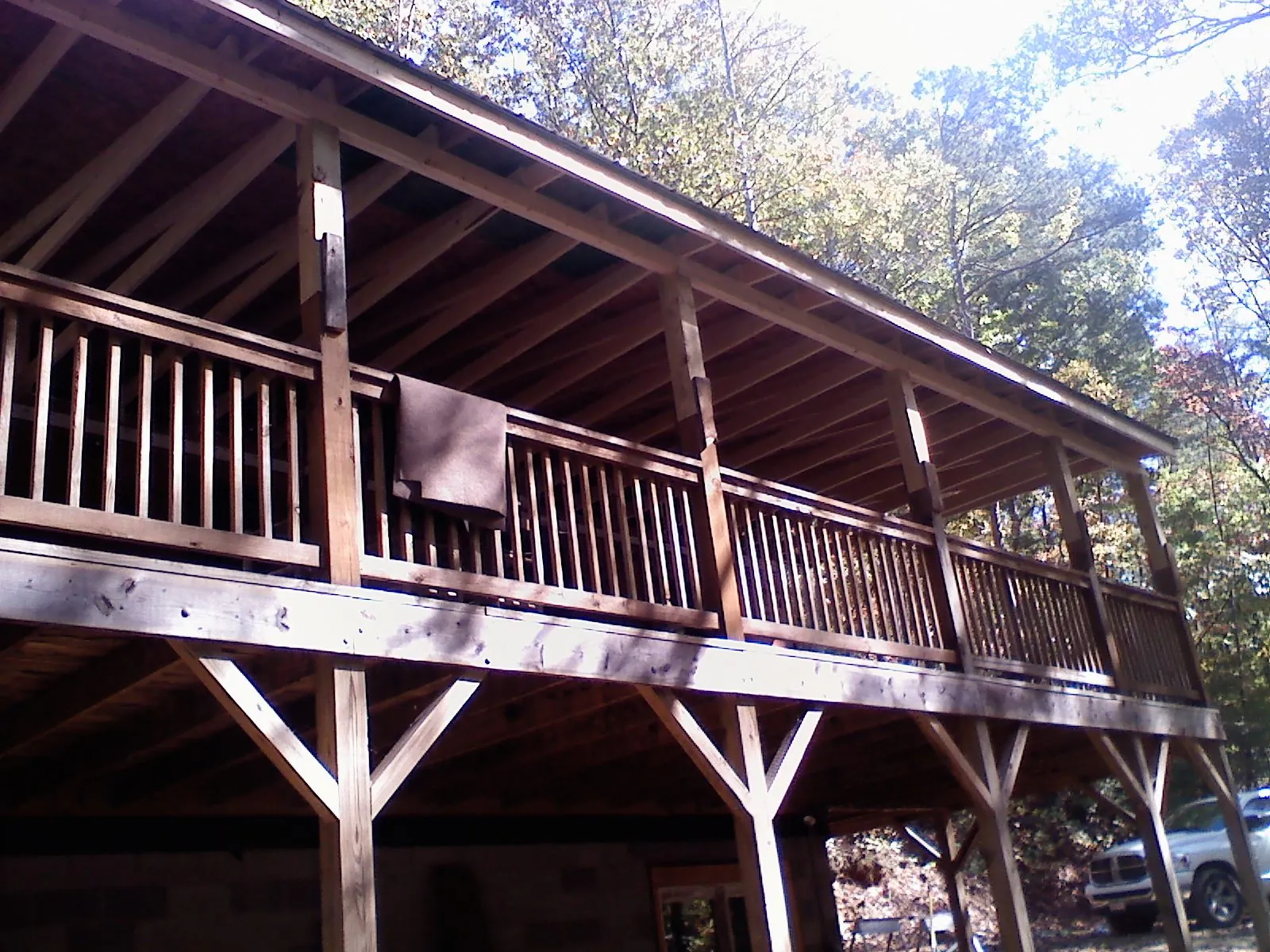 Timber framing under a new elevated porch and deck — Roof Leak Repair in Quogue by Roofing Brothers